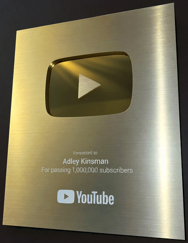 YouTube creator award presented to Adley Kinsman for passing one million subscribers
